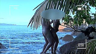 voyeur films couple fucking on the beach