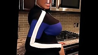 huge boobs in rubber mini dress