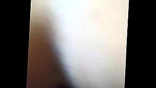 asian girl getting her hairy pussy fucked with vibrator and strapon on the bed in the room
